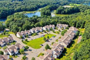 Aerial (drone) image of a condominium complex is Stoughton, MA.