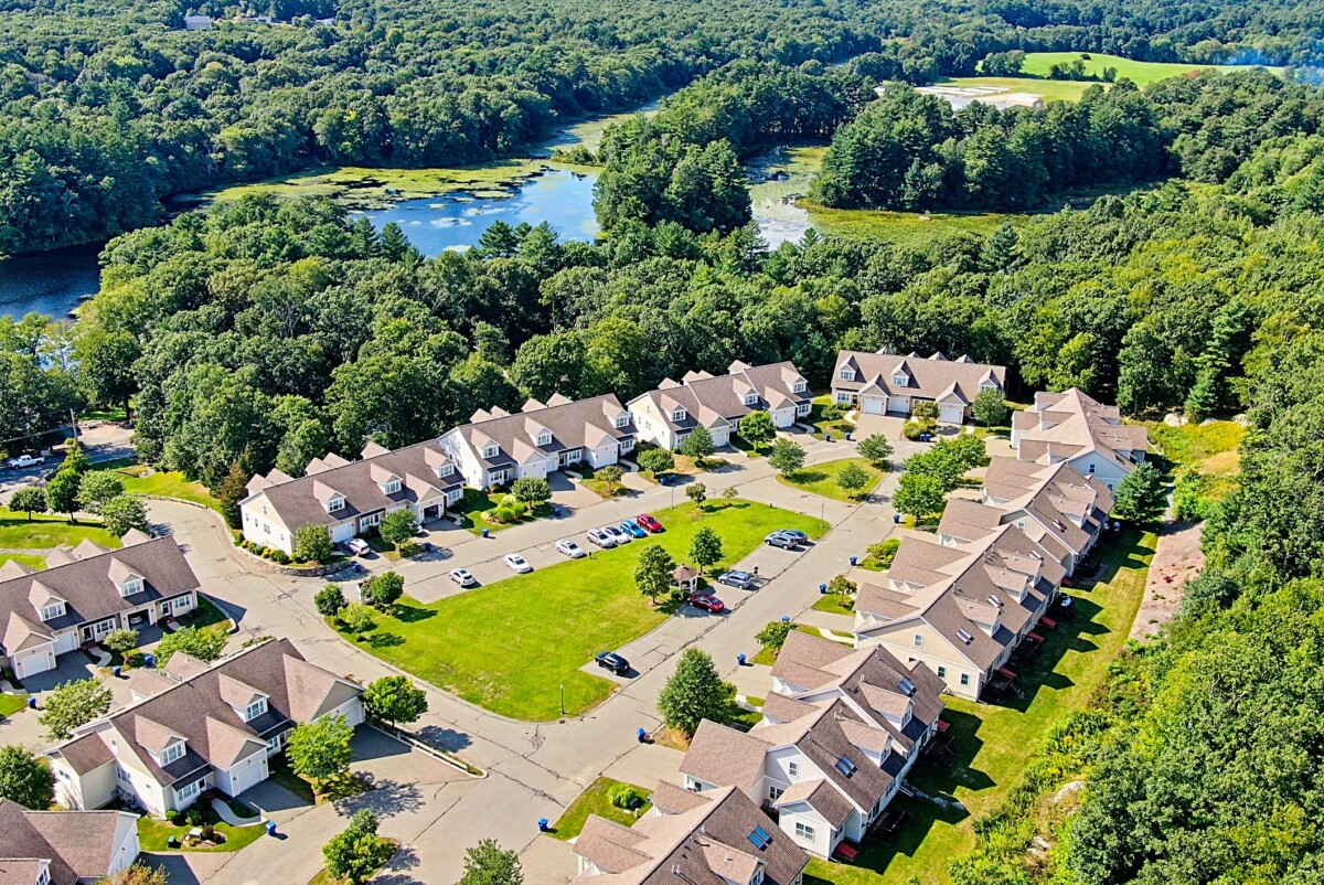 Aerial (drone) image of a condominium complex is Stoughton, MA, by Lew Corcoran - Home Stager and Real Estate Photographer