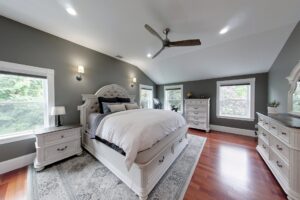 Image of the primary bedroom in a 2-story colonial style home in Foxboro, MA.
